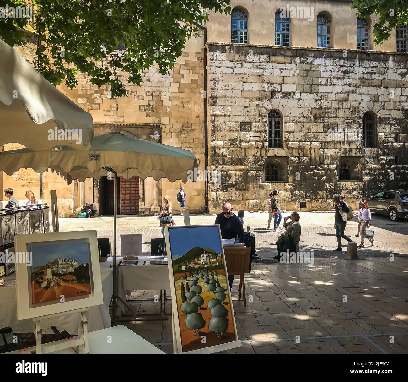 Aix-en-Provence, France, May 2022, view of some pictures and paintings in an artist market at place de l`Université Stock Photo